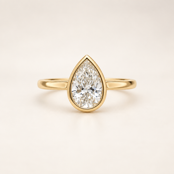 Pear bezel solitaire ring front view