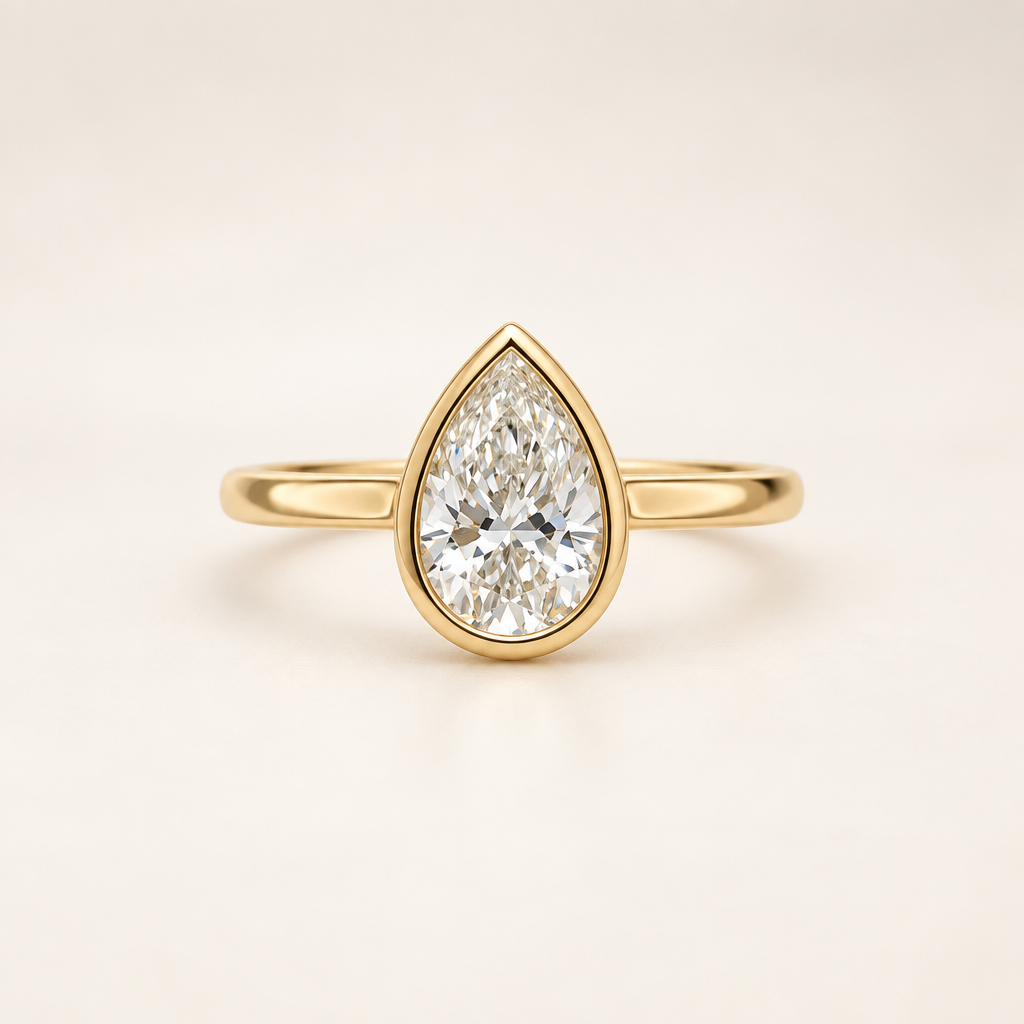 Pear bezel solitaire ring front view