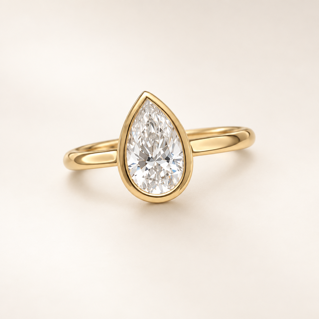 Pear bezel solitaire ring three-quarter view